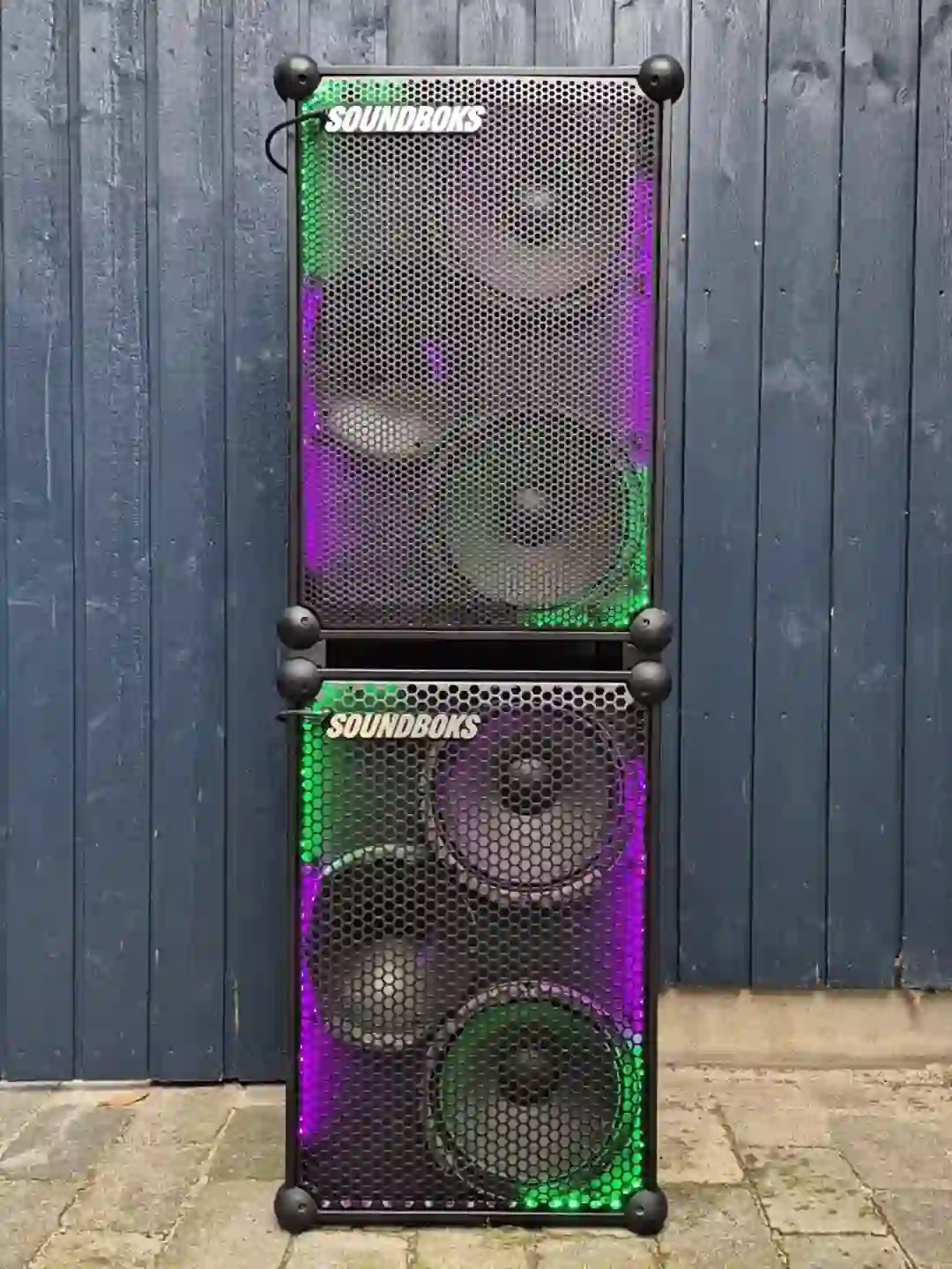 Soundboks stackers between two stacked Soundbokses